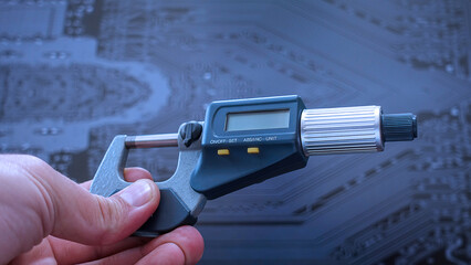 Еnegineer working with precise micrometer with digital display for quality control. Close up horizontal video of accurate measuring instrument. Micrometer tool showing the exact diameter and thickness