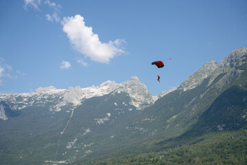 Parasailor glides over mountains