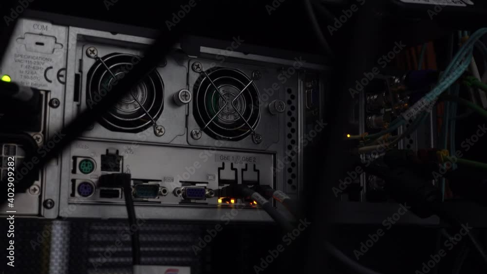 Poster network cables connected to switch in server room at the data centre. blink led