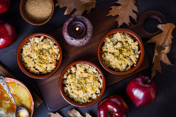 Small apple crambles or applie pies for autumn and winter