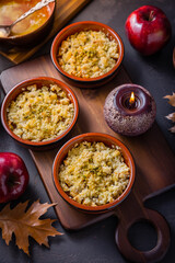 Small apple crambles or applie pies for autumn and winter