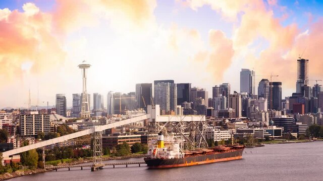 Cinemagraph Continuous Loop Animation. Downtown Seattle, Washington, United States of America. Aerial Panoramic View of the Modern City on the Pacific Ocean Coast. Dramatic Sunset Sky Art Render.