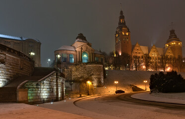 Fototapeta na wymiar Szczecin - snow-covered winter Haken's terraces at night.