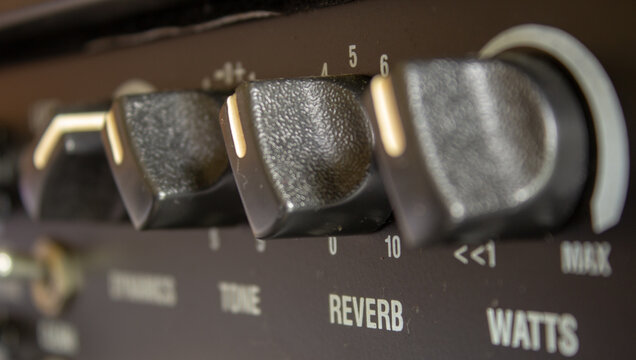 Buttons, knobs and lights of a guitar amplifier