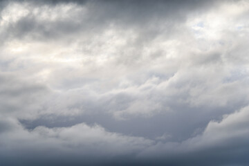 Stormy gray skies as a monochromatic nature background 
