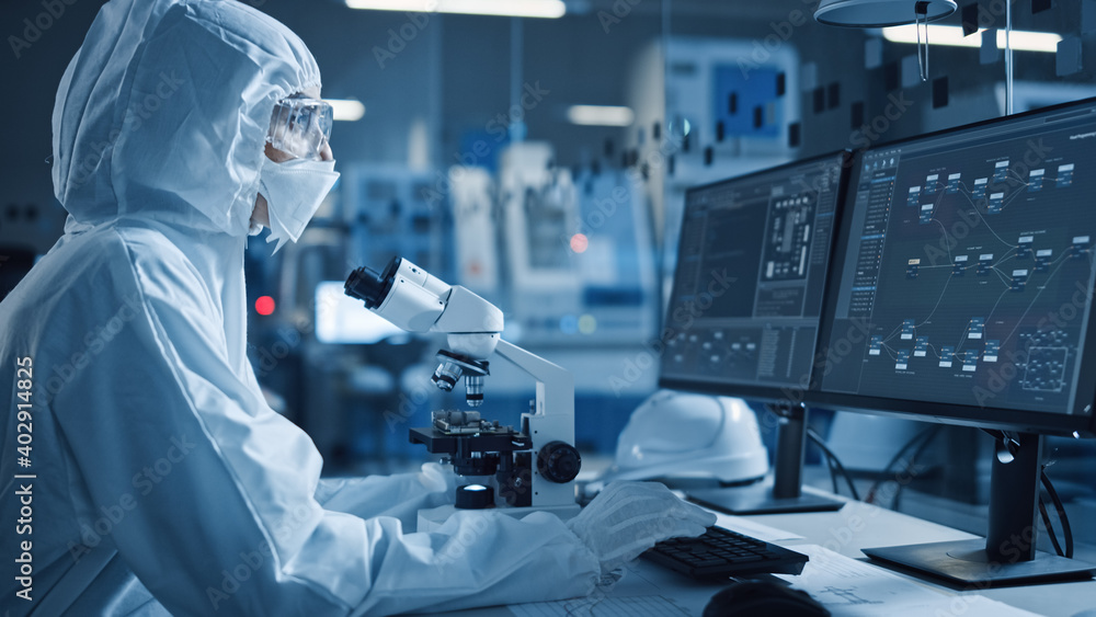 Aufkleber Research Factory Cleanroom: Engineer / Scientist wearing Coverall and Gloves Use Microscope to Inspect Motherboard Microprocessor Component, Developing High Tech Modern Electronics