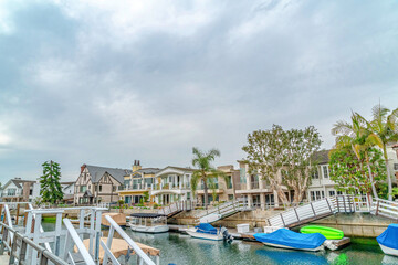 Fototapeta na wymiar Charming community in Long Beach California with waterfront homes along a canal