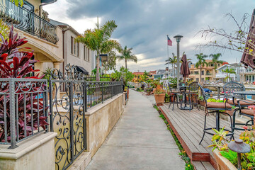 Waterfront houses and walkway along the dreamy canal in Long Beach California