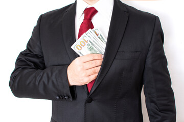 Closeup of businessman's hands with US dollar bills. White background. 