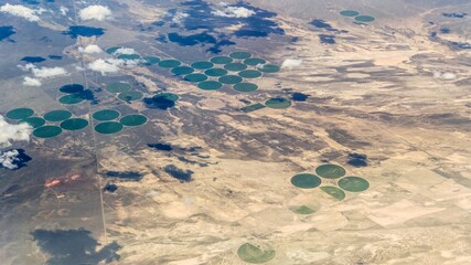 Aerial view of the midwest faring usiing center pivot irrigation in the United States
