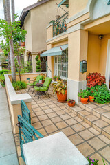 Fototapeta na wymiar Relaxing paved patio at the front of house in Long Beach California neighborhood