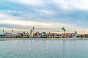 Scenic coastal neighborhood scenery in Long Beach California against cloudy sky