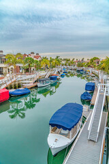Aerial view of canal with stairs and boat docks in scenic Long Beach California