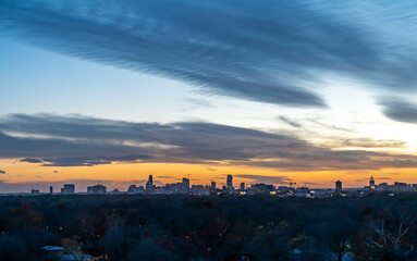 Fototapeta premium View of Austin Skyline During Sunset With Some Clouds in the Skies