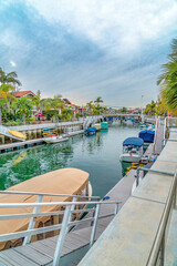 Obraz premium Long Beach California scenery with stairs boats and docks at the scenic canal