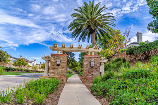 Road pathway and gate at the entrance of neighborhood in Huntington Beach CA