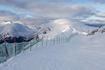 Empty ski slope near Kasprowy Wierch summit, Tatry mountains, Poland