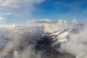 Low clouds over Tatry mountains during winter, Poland
