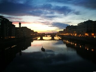 Fototapeta premium sunset over the river arno