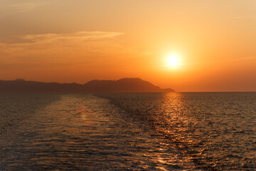 sunset over the sea ,Deniz üzerinde günbatımı , günbatımı , Gemide günbatımı , Gemide adaya karşı gün batımı 