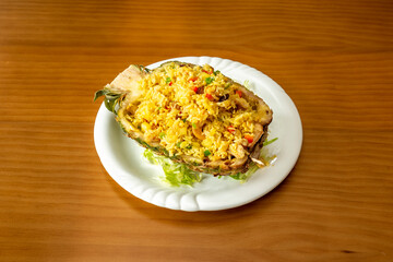 rice with pineapple on white plate