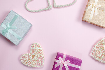 Valentines hearts, gift box on pink background