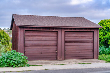 Fototapeta na wymiar Detached two car garage of home in San Diego California with sky background