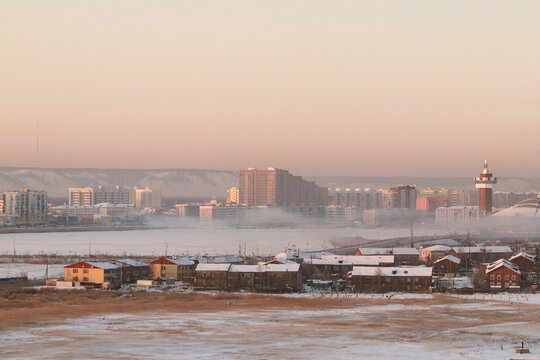 Winter frozen fog over Yakutsk, the capital of Sakha (Yakutia) Republic at sunset