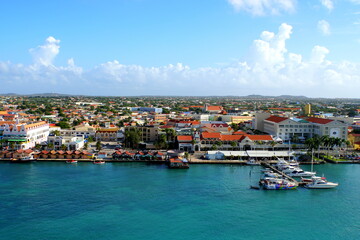 The aerial view of the ports, boats and buildings along the harbor near Oranjestad, Aruba