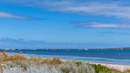 People enjoying the beauty of Palm beach, Mangles Bay