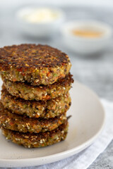 Fototapeta na wymiar Healthy vegan gluten free veggie fritters stacked on top of each other