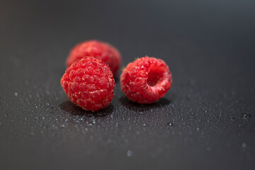 Raspberries on a sprayed surface