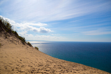 View of Lake Michigan from the top of Sleeping Bear Dunes on a sunny summer day.