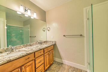 Double sink bathroom vanity with marble countertop cabinets and huge mirror