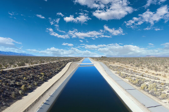 View Of The California Aqueduct Moving Water Through The Mojave Desert Towards Los Angeles.