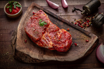 Pork steaks from tender tenderloin. Fresh raw meat prepared for cooking.
