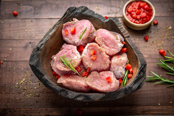 Sliced pork tenderloin. Fresh raw meat prepared for cooking.