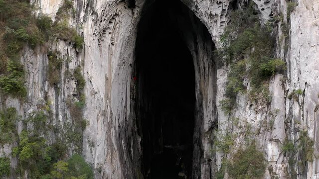 China's Great Arch of Getu, karst mountain rock climbing in Getu Valley, aerial