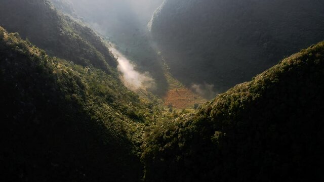 Dramatic mountain valley scenery, aerial view over karst mountain landscape