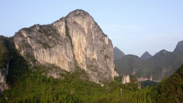Beautiful karst mountain rock face in remote Chinese countryside, aerial view