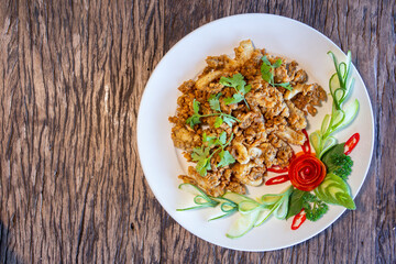 fried squid or octopus with garlic on plate