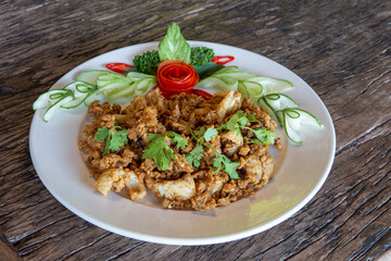 fried squid or octopus with garlic on plate