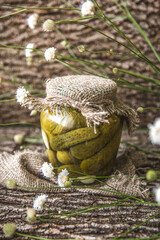 Preserved autumn vegetables. Delicious preserved crunchy pickles, in the glass jar. Rustic style
