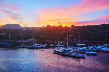 The sunset over the yacht haven, Ghajnsielem, Gozo, Malta