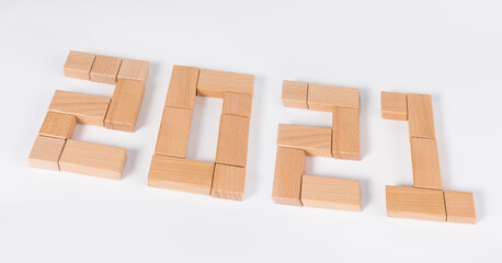 The number 2021 is printed on the building block