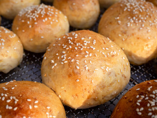 Fresh homemade burger buns with sesame seed.