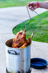 Frying a whole turkey outdoors