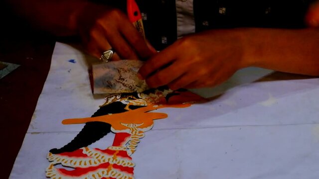 Coloring With Gold Transfer Paper In To Shadow Puppet. Wayang Kulit.