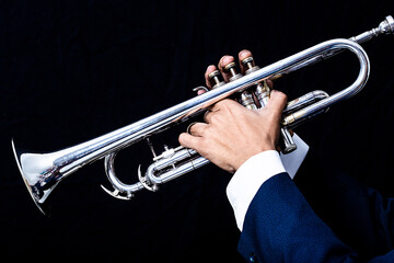 Classic musical trumpet  black background image composite