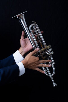 Classic musical trumpet  black background image composite